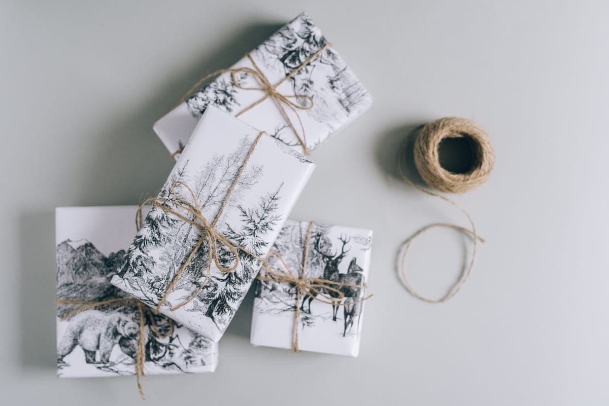 Gift boxes wrapped in plain paper and tied with twine