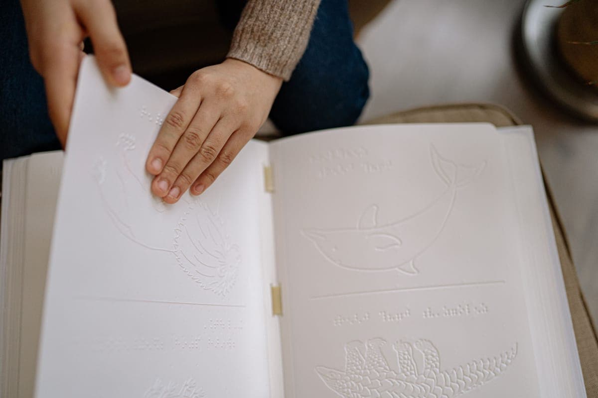 An open illustrated book about animals