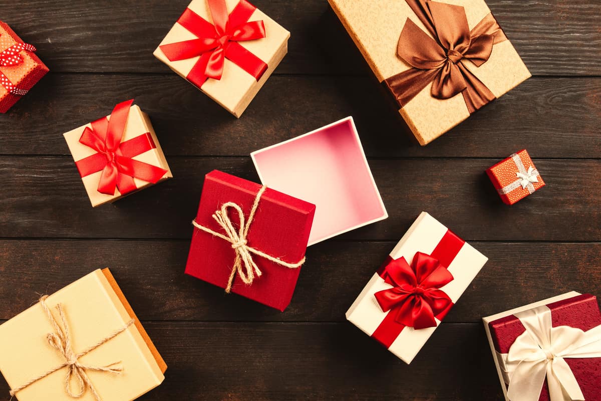 A gift box tied with a colored ribbon